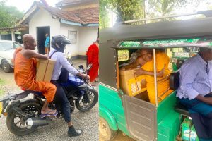 Buddhist monks carrying books on a motorbike and on a tuktuk.